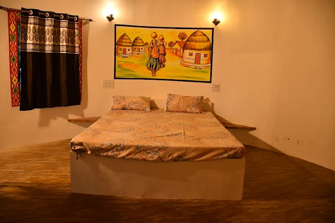 Bedroom with traditional Kutchi wall painting