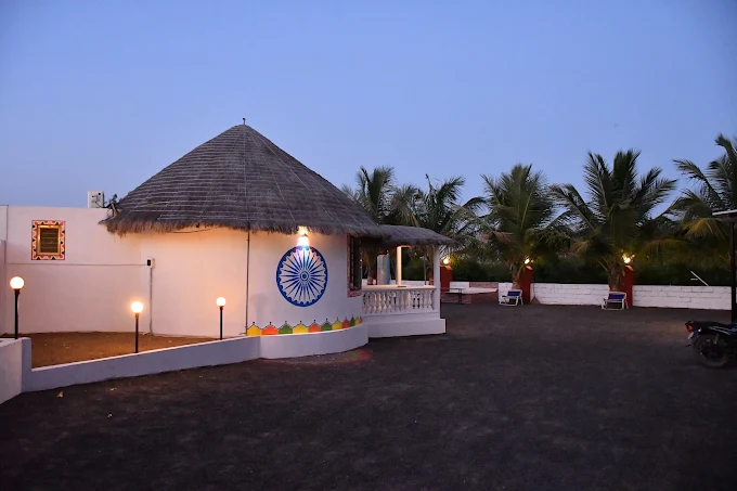 Thatched-roof cottage at Panchani Farm Villa and Resort, Kutch