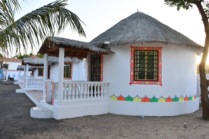 Thatched-roof cottage at Panchani Farm Villa and Resort, Kutch